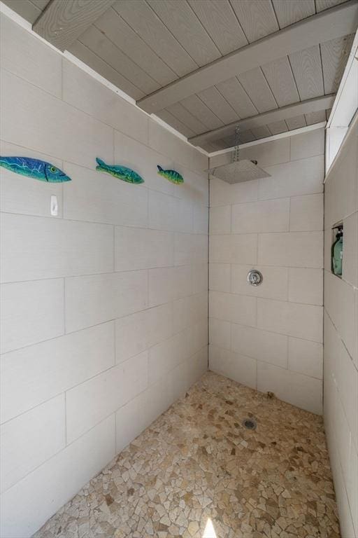 full bathroom with tiled shower