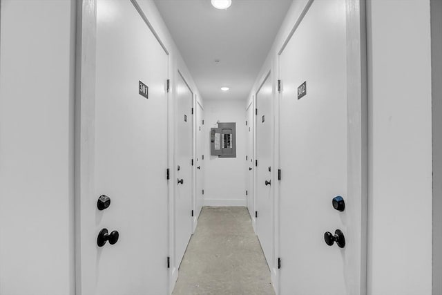 50 Main St Unit 101, Pepperell, MA 01463 - hall with electric panel, concrete floors, and recessed lighting