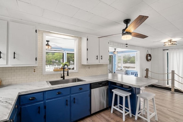 11 Hamilton Dr, Holland, MA 01521 - kitchen featuring stainless steel dishwasher, a sink, a ceiling fan, and healthy amount of natural light