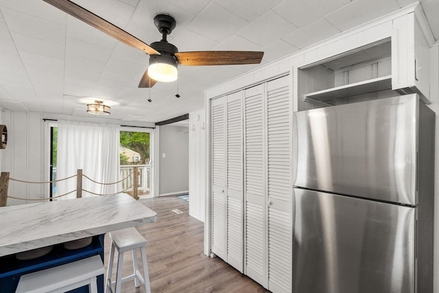 11 Hamilton Dr, Holland, MA 01521 - kitchen featuring freestanding refrigerator, wood finished floors, and ceiling fan