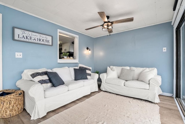 11 Hamilton Dr, Holland, MA 01521 - living area with crown molding, ceiling fan, and wood finished floors