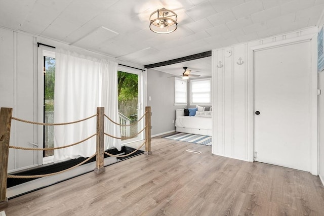 11 Hamilton Dr, Holland, MA 01521 - unfurnished living room featuring wood finished floors and a ceiling fan