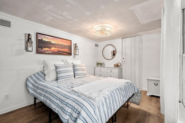 11 Hamilton Dr, Holland, MA 01521 - bedroom featuring wood finished floors, a textured ceiling, and baseboards