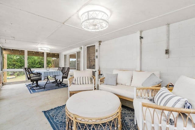 11 Hamilton Dr, Holland, MA 01521 - sunroom / solarium featuring concrete floors and concrete block wall