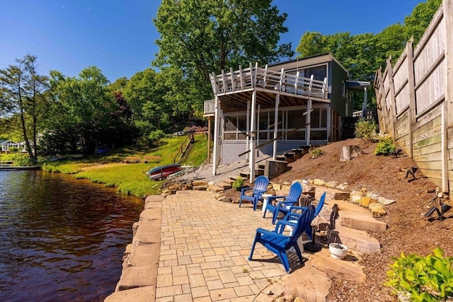 11 Hamilton Dr, Holland, MA 01521 - view of patio / terrace with a water view and stairs