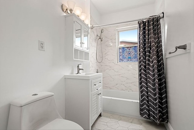full bathroom with vanity, shower / tub combo, and toilet
