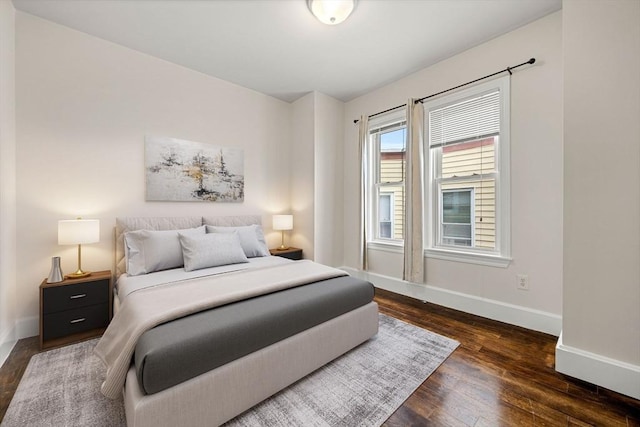 bedroom featuring dark hardwood / wood-style floors