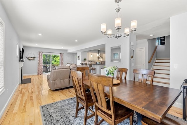 10 Brickett Ave, Haverhill, MA 01830 - dining room featuring stairway, light wood finished floors, baseboards, a chandelier, and recessed lighting
