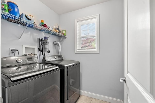 10 Brickett Ave, Haverhill, MA 01830 - clothes washing area with independent washer and dryer, baseboards, and light tile patterned floors