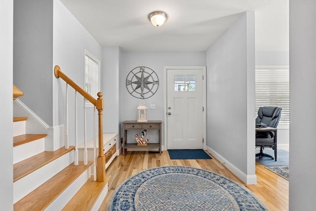 10 Brickett Ave, Haverhill, MA 01830 - entrance foyer with light wood-style floors, baseboards, and stairs