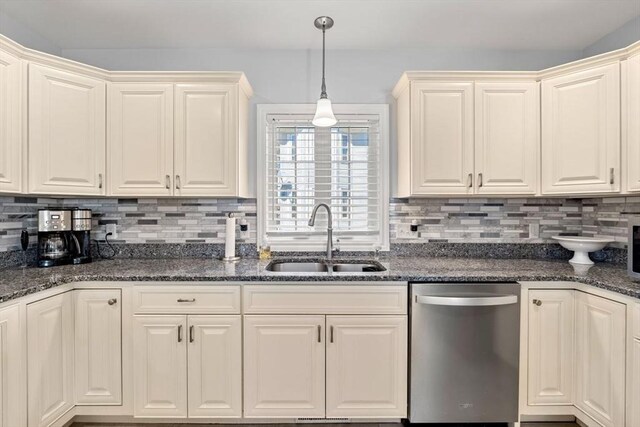 10 Brickett Ave, Haverhill, MA 01830 - kitchen featuring stainless steel dishwasher, a sink, tasteful backsplash, decorative light fixtures, and dark stone countertops