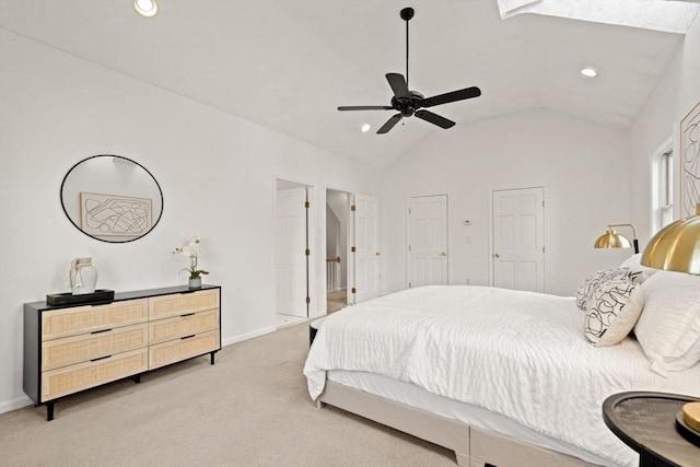 bedroom with recessed lighting, light colored carpet, baseboards, and vaulted ceiling