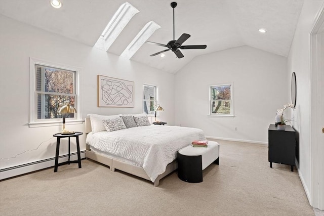 bedroom featuring baseboards, lofted ceiling with skylight, carpet flooring, recessed lighting, and a baseboard radiator