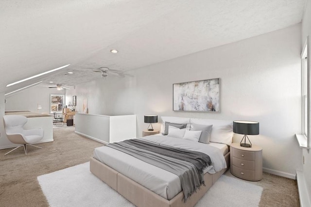 carpeted bedroom with a textured ceiling and baseboards