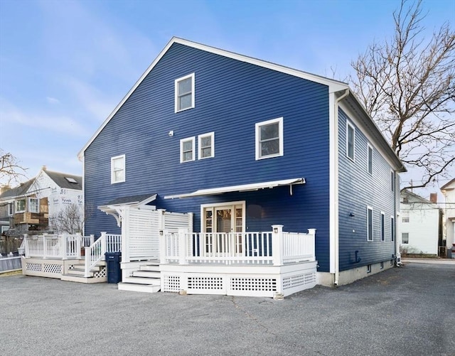 view of front of house with a wooden deck