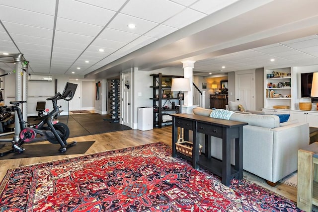 27 Gully Ln, Sandwich, MA 02537 - workout area featuring wood finished floors, a drop ceiling, and recessed lighting