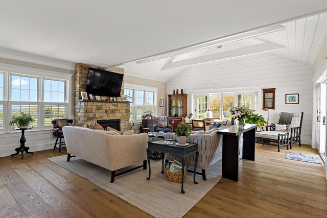 27 Gully Ln, Sandwich, MA 02537 - living room with wood finished floors and a stone fireplace