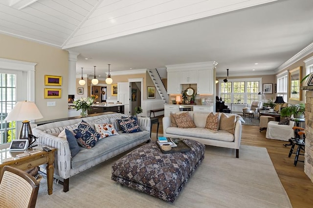 27 Gully Ln, Sandwich, MA 02537 - living area featuring light wood-type flooring, crown molding, stairway, and recessed lighting