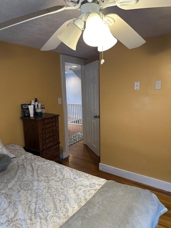 10 Marilyn Dr, Auburn, MA 01501 - bedroom with wood finished floors and a ceiling fan