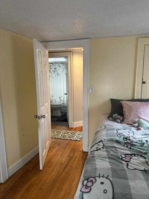 10 Marilyn Dr, Auburn, MA 01501 - bedroom with wood finished floors and a textured ceiling