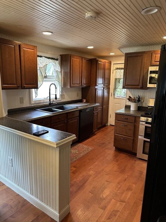 10 Marilyn Dr, Auburn, MA 01501 - kitchen featuring stainless steel appliances, dark countertops, healthy amount of natural light, a peninsula, and recessed lighting