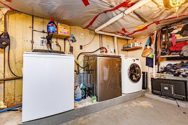 interior space with laundry area and washer and dryer