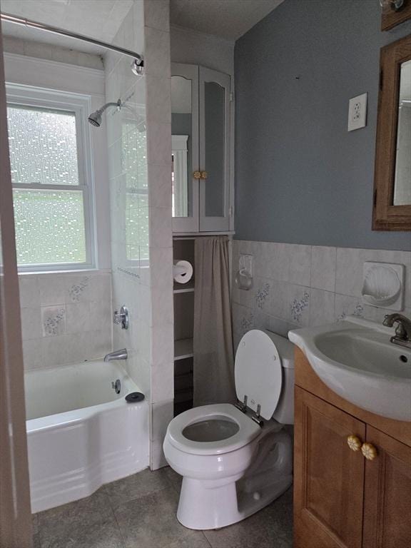 26 Kendig, Worcester, MA 01610 - bathroom with tile walls, shower / bath combination, vanity, tile patterned flooring, and wainscoting
