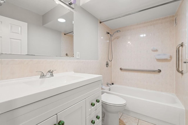99 Pond Ave Unit 220, Brookline, MA 02445 - bathroom with  shower combination, vanity, tile patterned flooring, and tile walls
