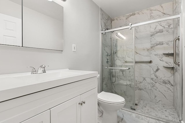 99 Pond Ave Unit 220, Brookline, MA 02445 - full bathroom featuring marble look tiles, a marble finish shower, and vanity