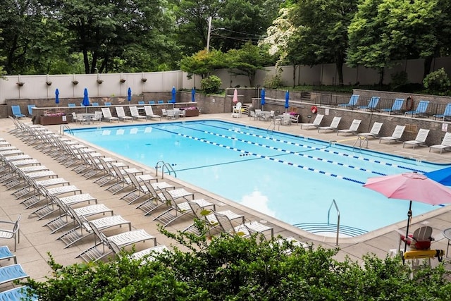 99 Pond Ave Unit 220, Brookline, MA 02445 - community pool with view of scattered trees