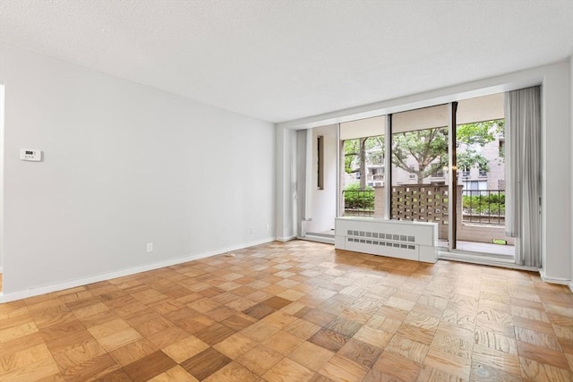99 Pond Ave Unit 220, Brookline, MA 02445 - empty room featuring baseboards