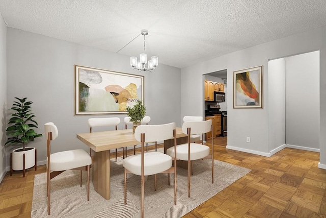 99 Pond Ave Unit 220, Brookline, MA 02445 - dining room with a chandelier and a textured ceiling