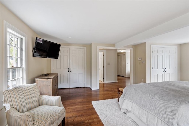 894 Great Pond Rd, North Andover, MA 01845 - bedroom with dark wood-style flooring and baseboards