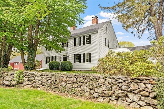 894 Great Pond Rd, North Andover, MA 01845 - rear view of property featuring a chimney