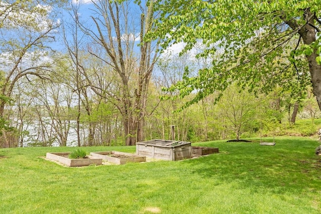 894 Great Pond Rd, North Andover, MA 01845 - view of green lawn featuring a vegetable garden