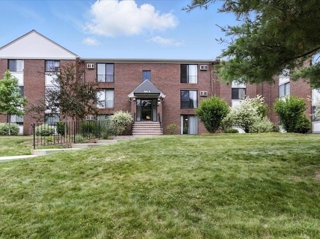 386 Great Rd Unit A3, Acton, MA 01720 - view of front of property with a front yard and brick siding