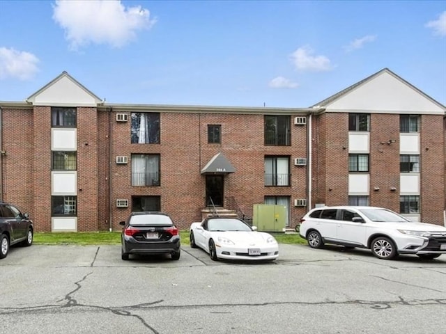 386 Great Rd Unit A3, Acton, MA 01720 - view of apartment building / complex with uncovered parking