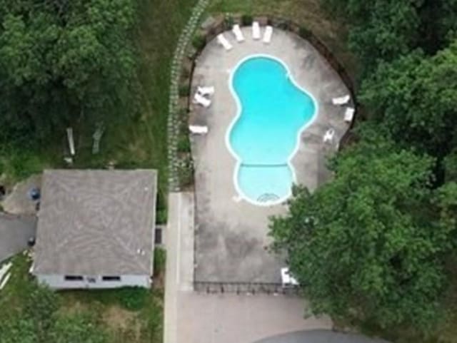 386 Great Rd Unit A3, Acton, MA 01720 - drone / aerial view of a pool