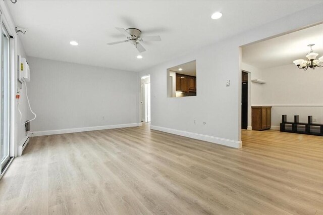 386 Great Rd Unit A3, Acton, MA 01720 - unfurnished living room with a chandelier, light wood-style flooring, recessed lighting, and a ceiling fan