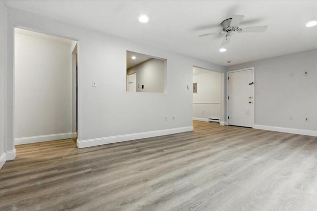 386 Great Rd Unit A3, Acton, MA 01720 - spare room featuring ceiling fan, recessed lighting, wood finished floors, and baseboard heating