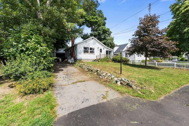 view of front of home with a front yard