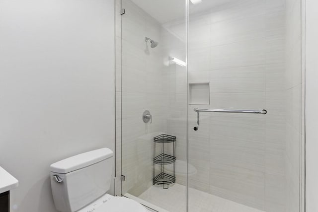 49 Melcher St Unit 405, Boston, MA 02110 - bathroom featuring toilet, a stall shower, and vanity