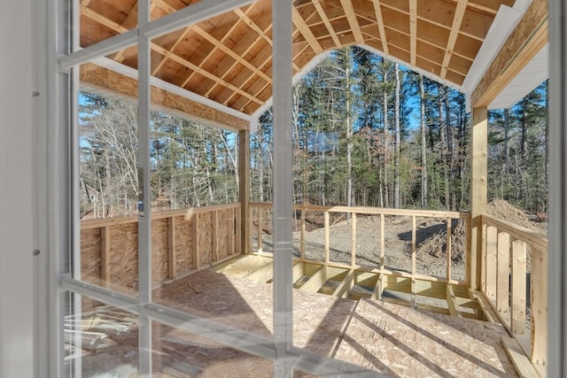 sunroom with lofted ceiling