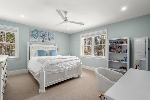 bedroom featuring recessed lighting, baseboards, and light colored carpet