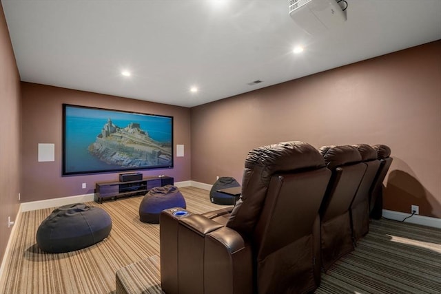 home theater room featuring recessed lighting, visible vents, and baseboards