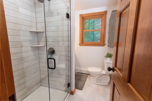 bedroom featuring access to exterior, ceiling fan, baseboard heating, a textured ceiling, and dark hardwood / wood-style flooring