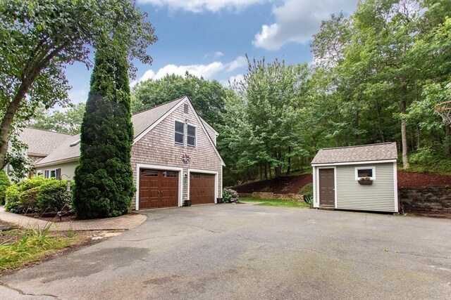 garage with a lawn