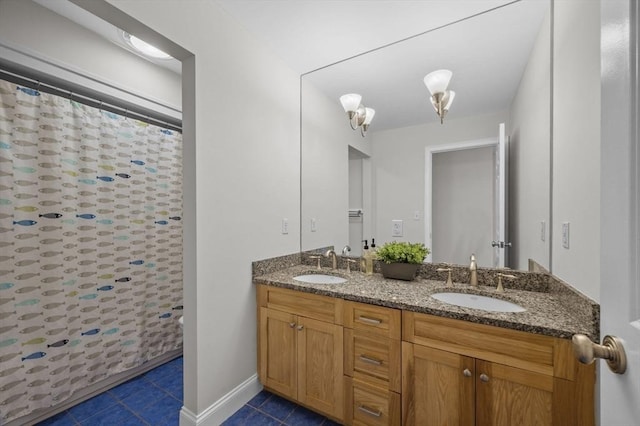 bathroom featuring tile patterned floors and vanity