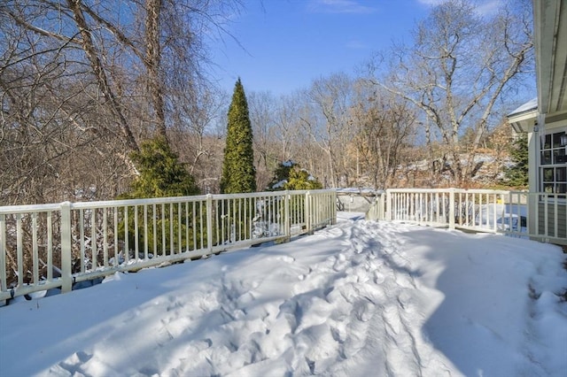 view of snow covered deck