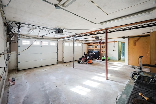 garage featuring a garage door opener